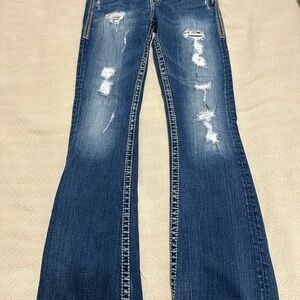 Distressed Blue Jeans